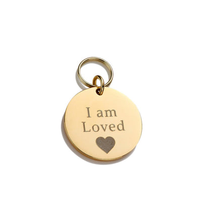 Gold Cat ID Tag engraved with "I Am Loved" and love heart