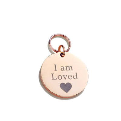 Rose Gold Cat ID Tag engraved with "I Am Loved" and love heart